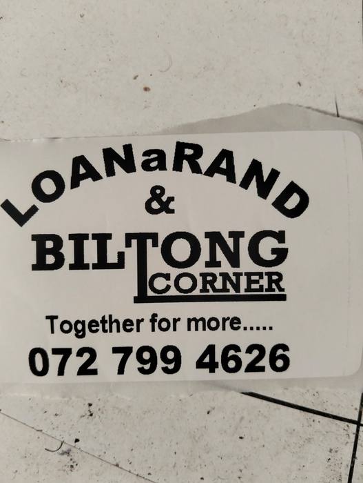 Cut vinyl shopfront sticker for Loan a Rand and Biltong Corner, Together for more