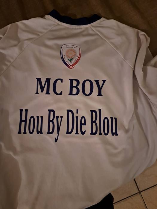 White Macassar rugby club jacket printed MC Boy and Hou By Die Blou below the club crest